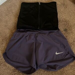 selling a waist trainer in the size (SMALL). the nike shorts in a size (SMALL)